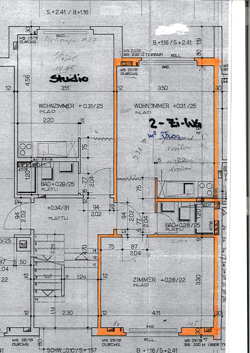 Floor plan showing a studio, two bedrooms, two bathrooms, and a hallway. Dimensions and room labels are indicated.