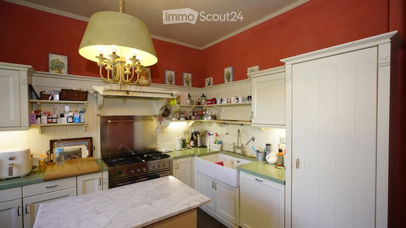 {"type": "Kitchen", "objects": ["cabinet", "stove", "sink", "faucet", "oven", "fridge", "chandelier", "cutting board", "faucet", "cupboard", "fridge", "oven", "sink", "faucet", "cupboard", "faucet", "cupboard", "cupboard", "cupboard", "cupboard", "cupboar