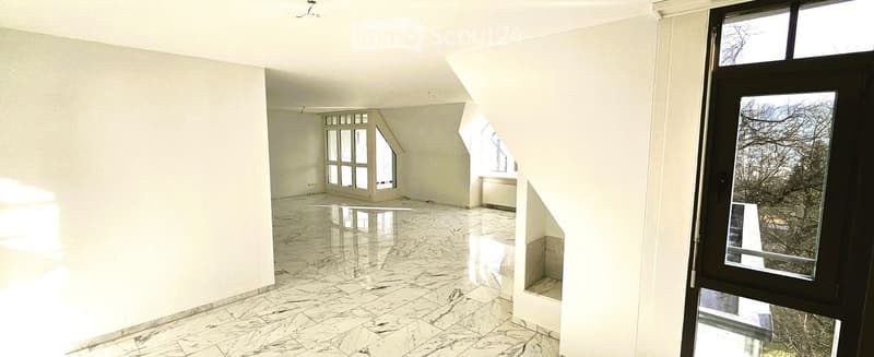 Empty room with white walls, polished marble floor, large windows, and a black door leading outside.