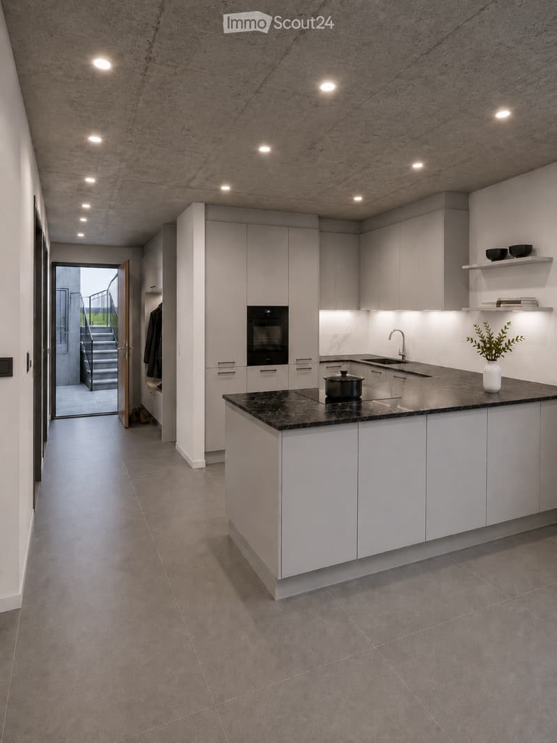 Modern kitchen with white cabinets, black marble countertop, built-in oven, sink, and decorative vase on the counter.