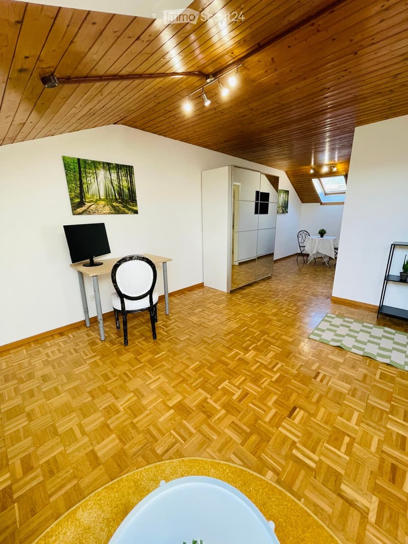 hardwood floor, wooden ceiling, desk with computer, chair, shelf, table with chair, dining table, mirror