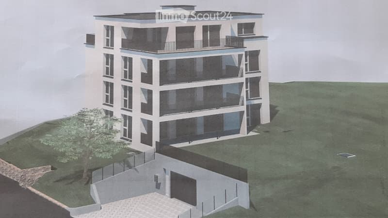 A modern multi-story building with large windows and balconies, set on a raised ground floor with a small tree nearby.