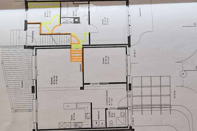 Floor plan of a house with multiple rooms including a hallway, living room, bedrooms, bathrooms, and a garage.