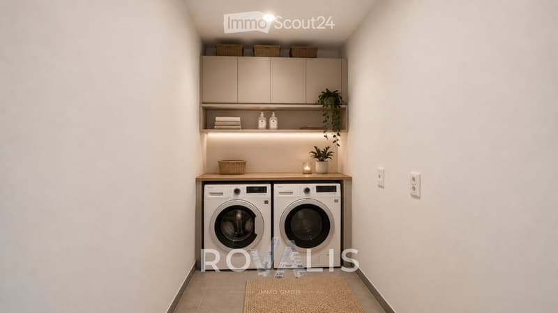 Modern laundry room with white washing machine and dryer, built-in cabinets, shelves with baskets, and small decorative plants.