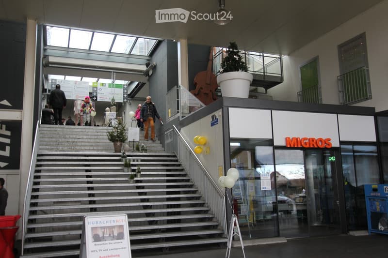 Public building entrance, staircase, sign, balloons