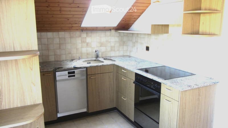 wooden cabinets, granite countertop, sink, dishwasher, oven, stovetop, wooden ceiling