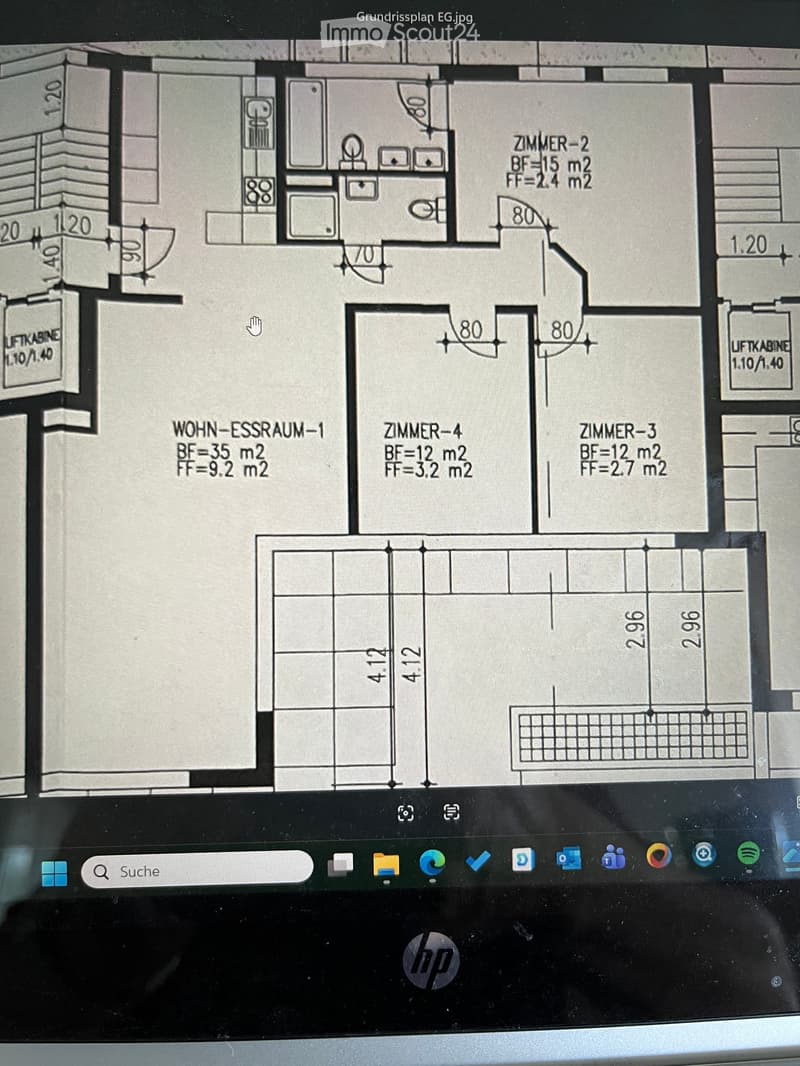 Ground floor plan showing a living-dining room, four bedrooms, and a bathroom. Dimensions and floor areas are labeled.