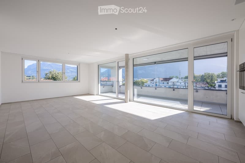 empty room, large sliding glass doors, balcony with railing, white walls, wooden tiles