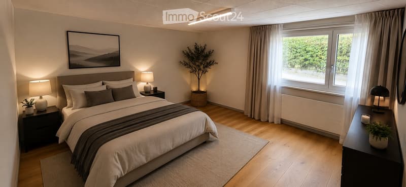 Modern bedroom with a large bed, nightstands, lamps, a picture frame on the wall, and a potted plant near the window.