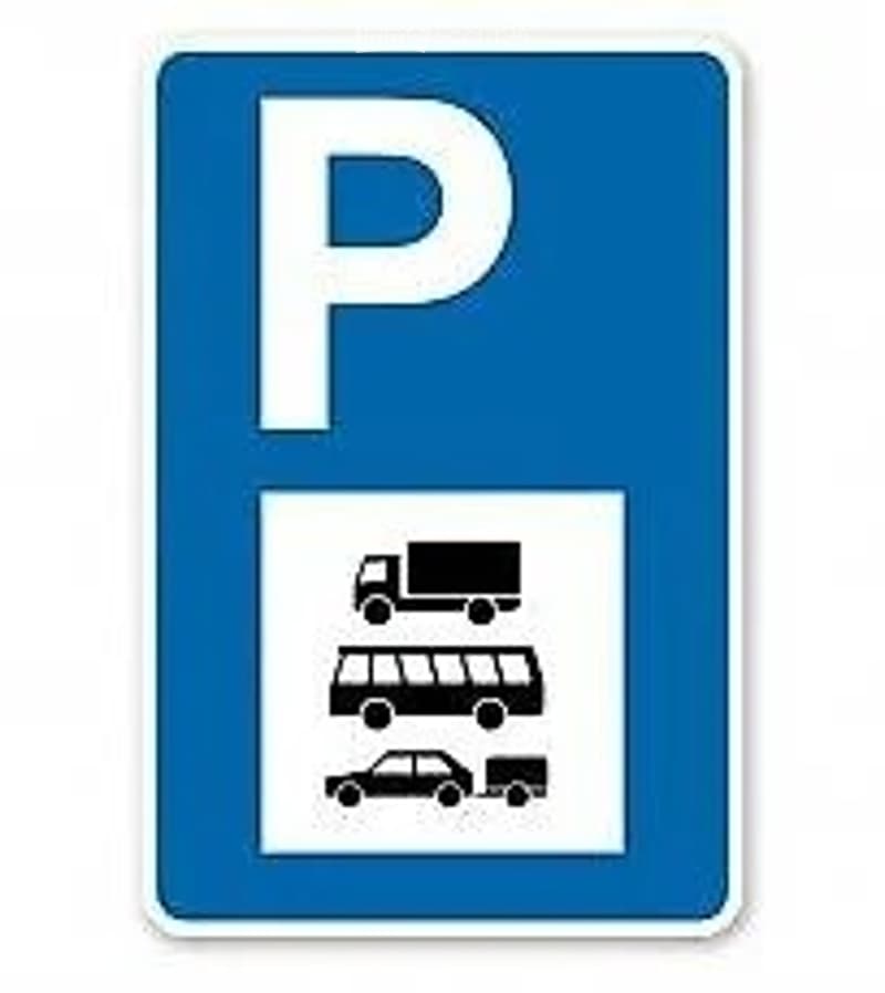 Parking sign indicating designated parking area for various vehicle types, including cars, trucks, and buses.