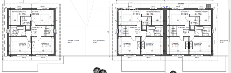 Floor plan of a multi-level house with three bedrooms, a dressing room, a bathroom, and two garages.