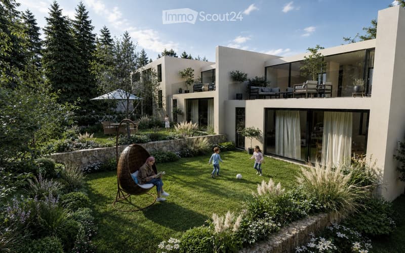 Modern house with a spacious garden, featuring a wicker hanging chair, a stone wall, and a well-maintained lawn. Children are playing on the grass, and there is a patio area with outdoor furniture on the upper level.