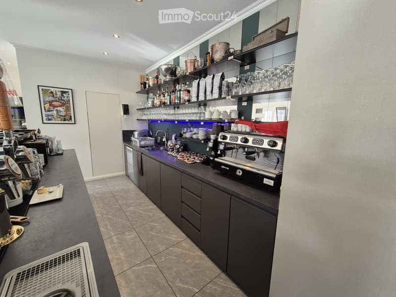 {"type": "Kitchen", "objects": ["faucet", "sink", "espresso machine", "cupboard", "cup", "bottle", "cupboard", "cup", "cup", "cup", "cup", "cup", "cup", "cup", "cup", "cup", "cup", "cup", "cup", "cup", "cup", "cup", "cup", "cup", "cup", "cup", "cup", "cup