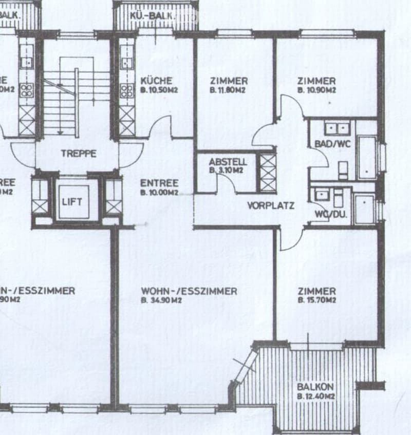 Floor plan showing a multi-room layout including a kitchen, living/dining room, bedrooms, bathrooms, storage, entrance, and balcony.