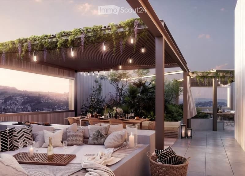 A modern rooftop terrace with a panoramic city view, featuring a lounge area with cushions and pillows, a dining table with chairs, and ambient lighting.