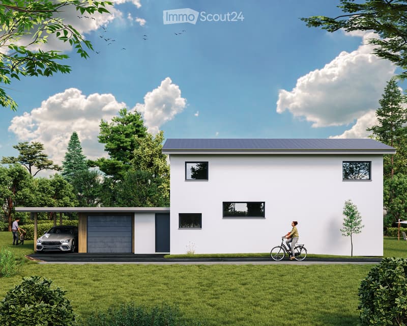 White modern house with garage, solar panels on the roof, green lawn