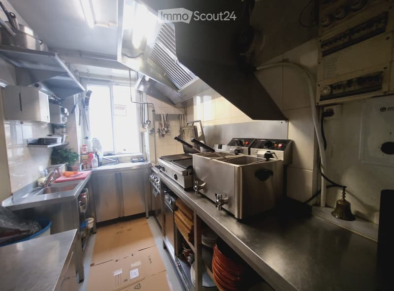 {"type": "Kitchen", "objects": ["sink", "fryer", "oven", "stove", "faucet", "cutting board", "faucet", "oven", "fryer", "oven", "oven", "oven", "oven", "oven", "oven", "oven", "oven", "oven", "oven", "oven", "oven", "oven", "oven", "oven", "oven", "oven",