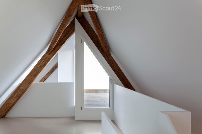 white walls, wooden beams, glass window, balcony