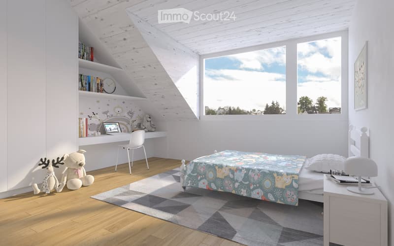 Bright, modern bedroom with wooden floors, white walls, and slanted ceilings. Features a colorful bedspread, a desk with a laptop, shelves with books and toys, and large windows offering a view of the sky.