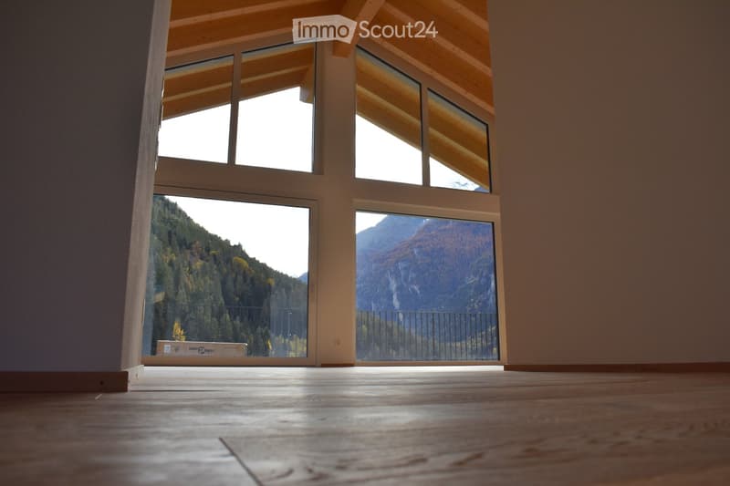 wooden floor, large windows, balcony, scenic mountain view