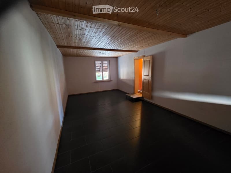 empty room, wooden ceiling, tiled floor, white walls, small window