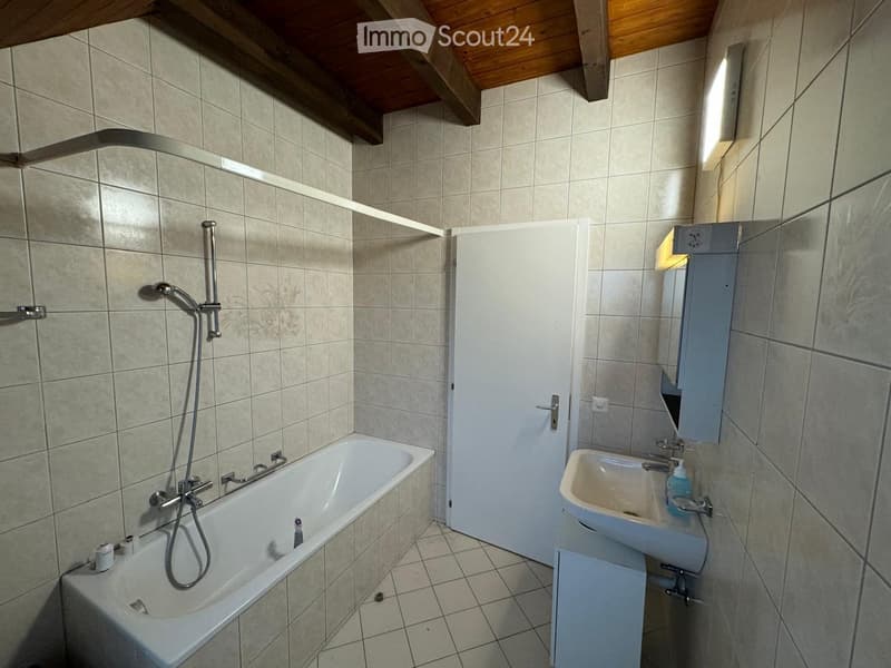 Bathroom with bathtub, sink, shower, and wooden ceiling