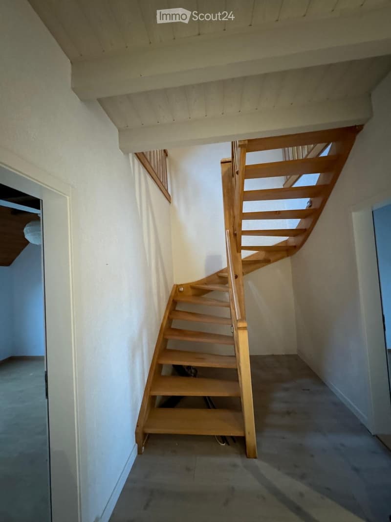 wooden staircase, white walls, wooden ceiling, wooden handrail