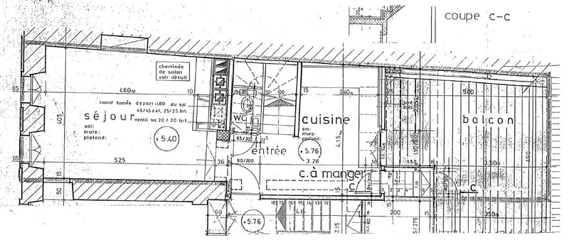 Floor plan showing a living room, kitchen, dining area, entrance, and balcony.
