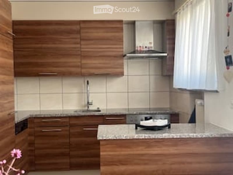 modern kitchen, wooden cabinets, granite countertops, stainless steel appliances, white tiled backsplash, white curtains