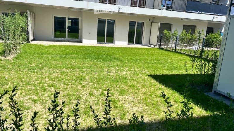Appartamento nuovo di 3,5 locali con grande giardino e posto auto sotterraneo incluso (1)