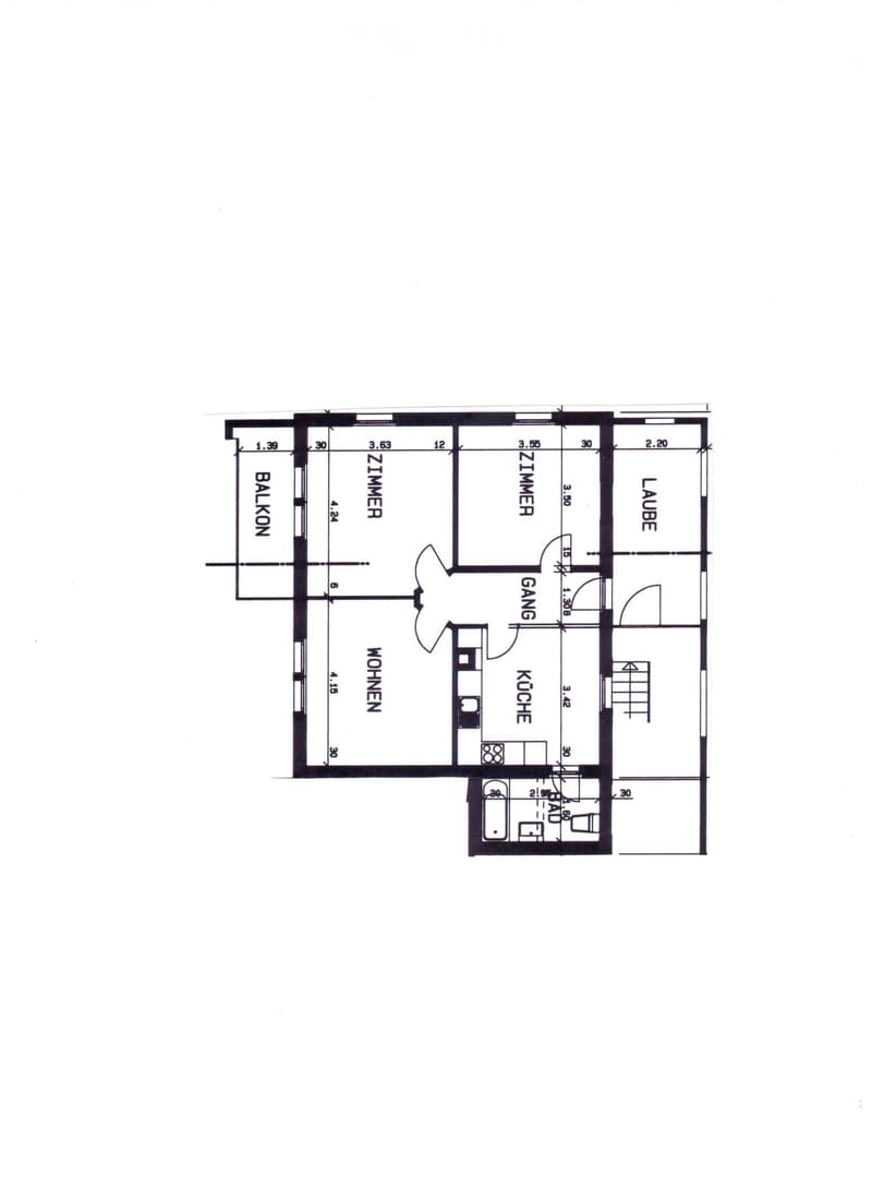 Floor plan showing a living area, kitchen, two bedrooms, hallway, balcony, and laundry area.
