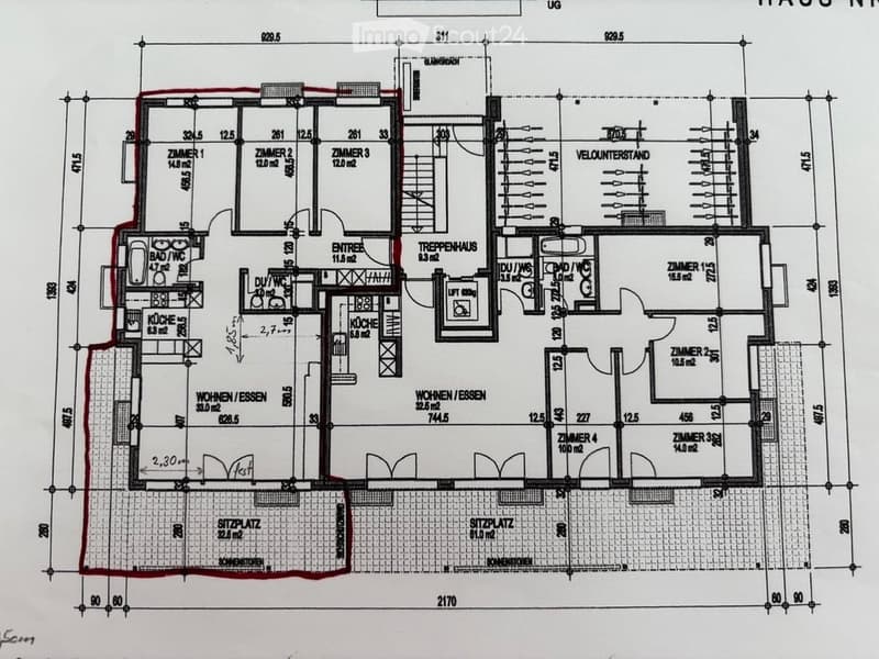 Floor plan of a multi-room apartment with labeled rooms including living/dining area, kitchen, bedrooms, bathrooms, and a balcony.