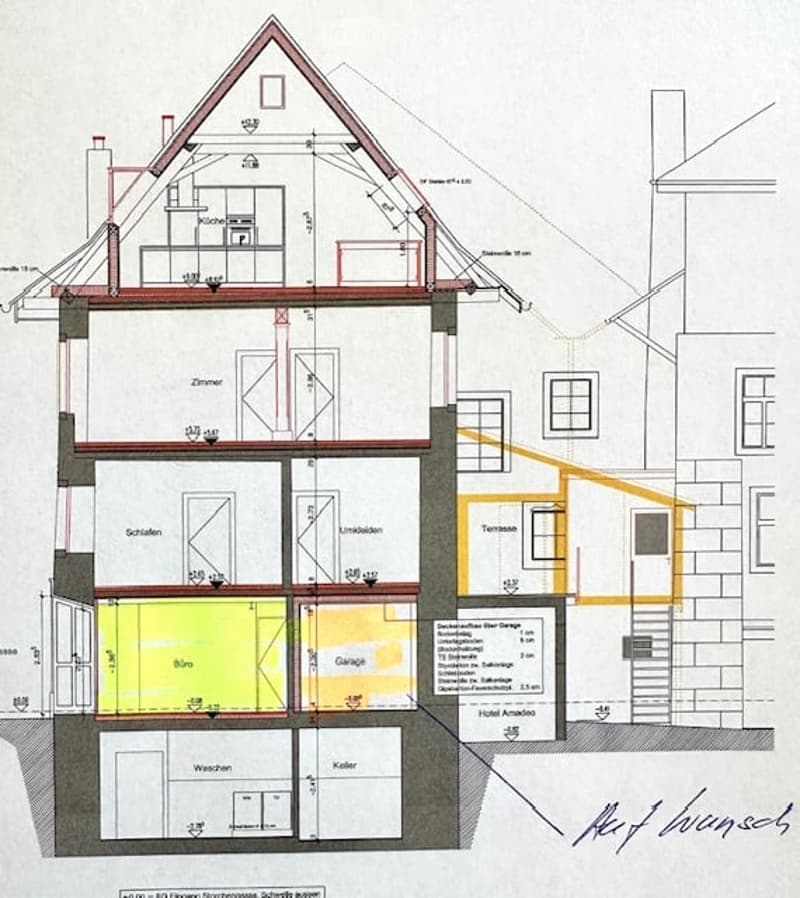 Floor plan of a house with multiple rooms including a kitchen, living room, bedrooms, garage, and terrace.