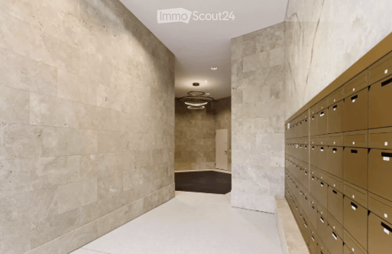 Marble walls, white floor, ceiling lights, storage boxes