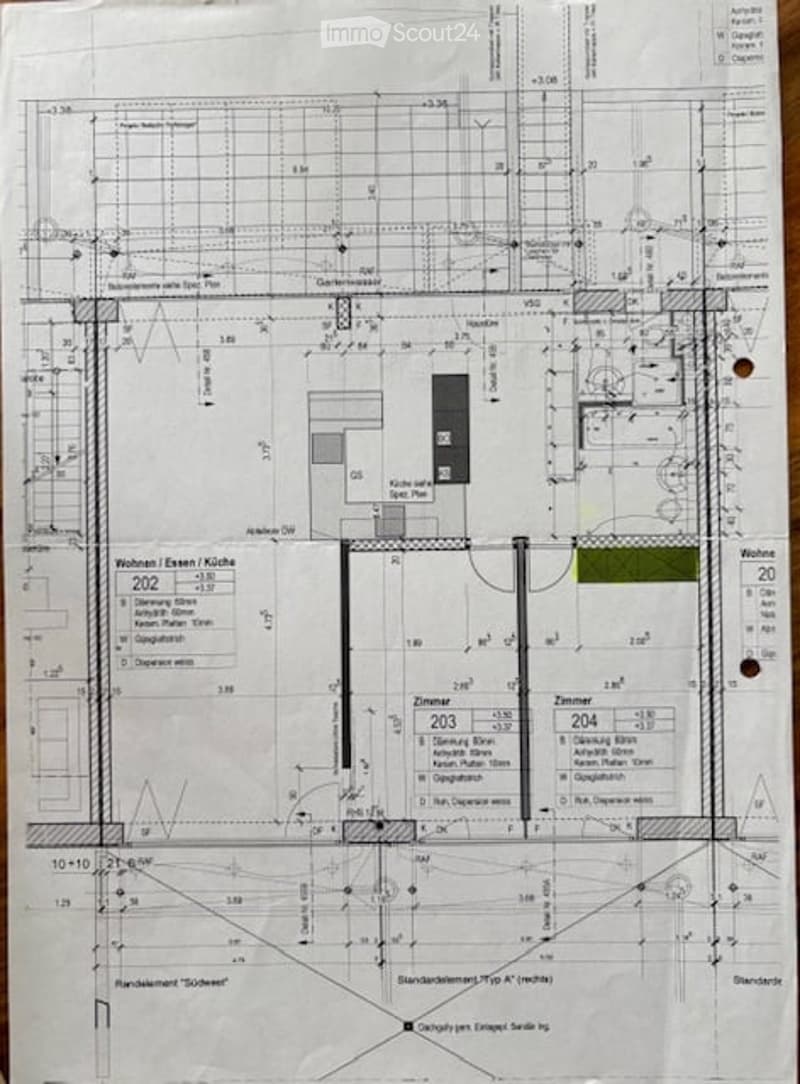 Floor plan of a residential unit showing multiple rooms including living spaces, bedrooms, and a kitchen.