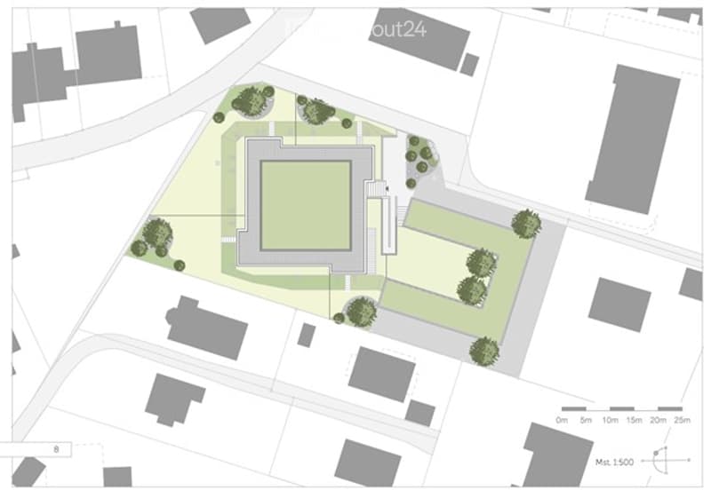 Site plan showing a central building surrounded by landscaped areas and trees, with pathways and surrounding structures.