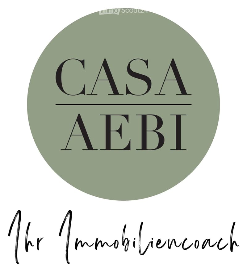 Logo with the words 'Casa Aebi' in black font on a gray background, and 'Your Real Estate Coach' written in cursive black font below the logo