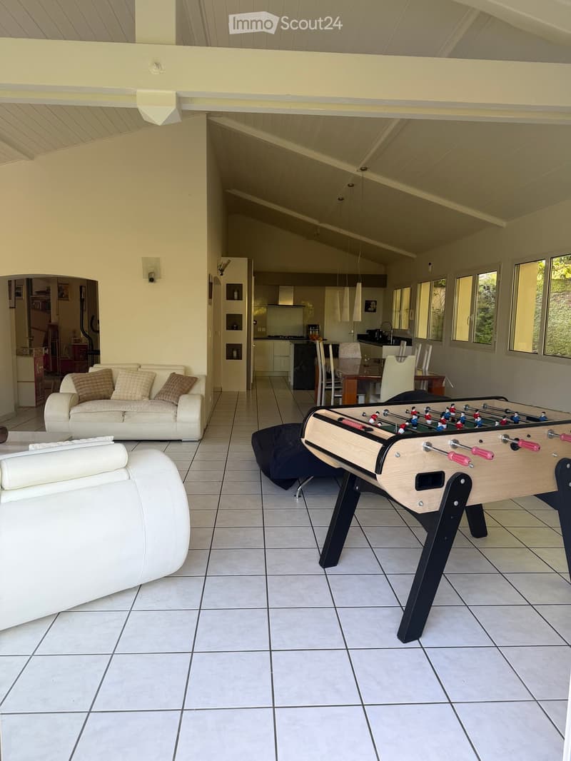 {"type": "Furnished Room", "objects": ["sofa", "chair", "table", "futon", "futon cover", "futon pillow", "futon throw", "futon blanket", "futon pillow", "futon throw", "futon blanket", "futon pillow", "futon throw", "futon blanket", "futon pillow", "futon
