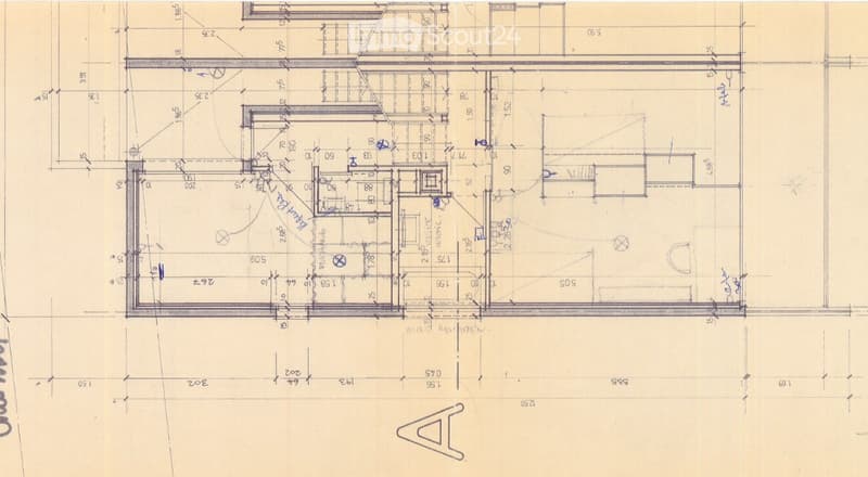 Floor plan of a residential space showing multiple rooms including a living area, bedrooms, bathrooms, and a kitchen.
