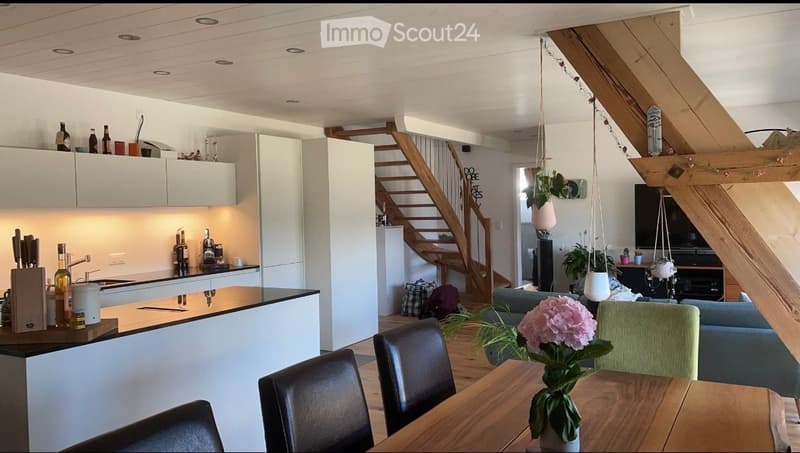 {"visible_features": [], "type": "Furnished Room", "objects": ["sofa", "table", "chair", "kitchen counter", "cabinet", "bottle", "stool", "stool", "stool", "stool", "stool", "stool", "stool", "stool", "stool", "stool", "stool", "stool", "stool", "stool",