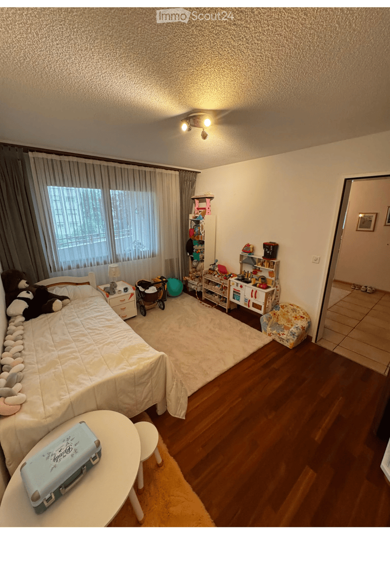 {"type": "Bedroom", "objects": ["bed", "nightstand", "toy shelf", "toy chair", "table", "stool", "suitcase", "toy stroller", "toy box", "toy car", "toy phone", "toy lamp", "toy", "toy", "toy", "toy", "toy", "toy", "toy", "toy", "toy", "toy", "toy", "toy",