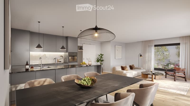 Modern open-plan living and dining area with grey cabinets, a white sofa, a wooden dining table, and pendant lights.