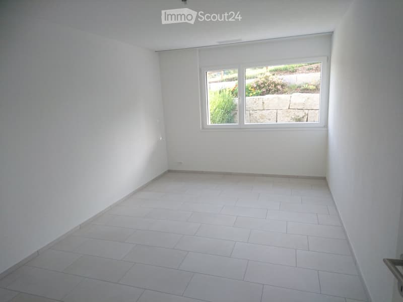 empty room, white walls, white tile flooring, single window