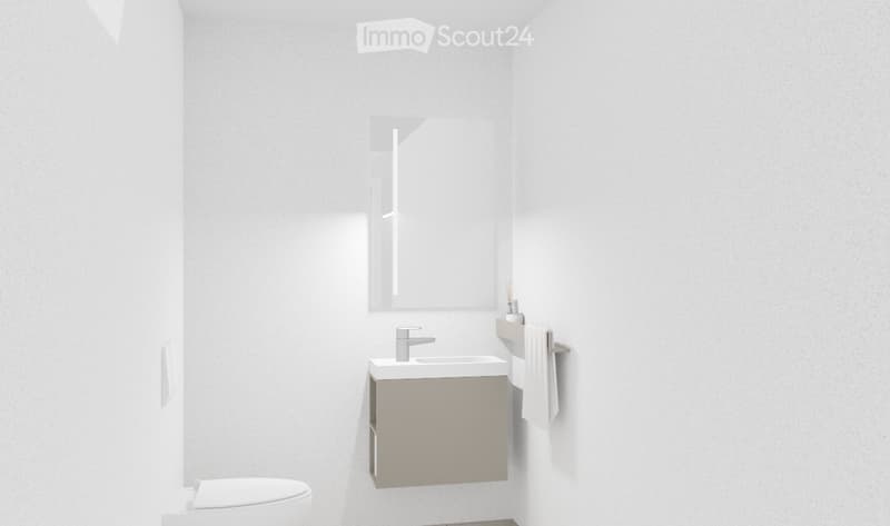 Modern bathroom with a white sink, mirror, and toilet. A towel hangs on a rack next to the sink.