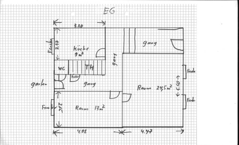 Hand-drawn floor plan of a ground floor (EG) showing a kitchen, living room, hallway, WC, and other spaces with labeled dimensions.