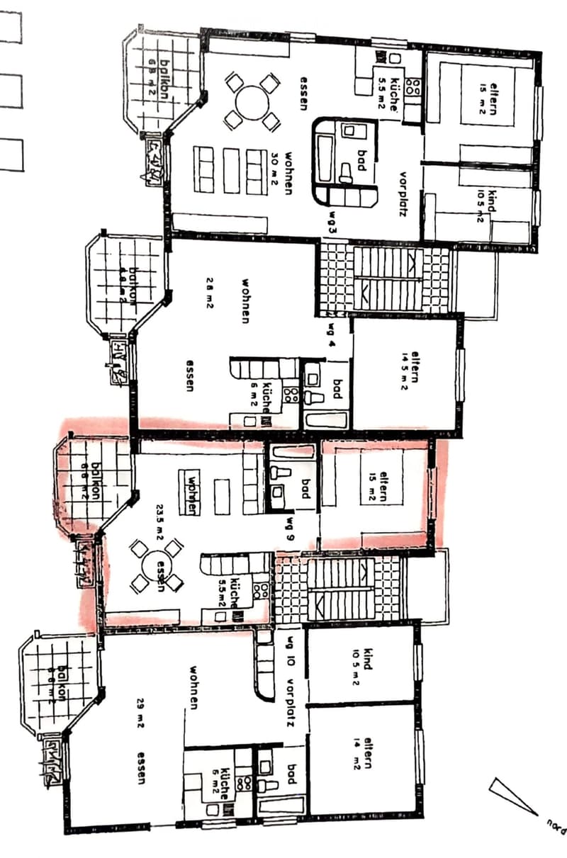 Floor plan of a multi-level residential building with multiple apartments, each containing living rooms, bedrooms, kitchens, and bathrooms.
