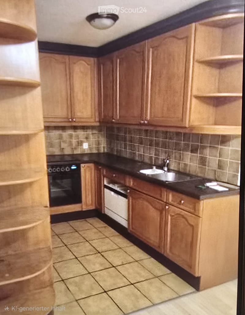 Kitchen with wooden cabinets, black countertop, sink, faucet, oven, and dishwasher.