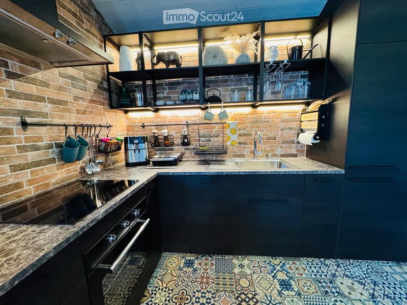 {"type": "Kitchen", "objects": ["oven", "sink", "faucet", "coffee maker", "cabinets", "cup hooks", "cup", "fridge", "oven", "oven handle", "oven door", "oven knob", "oven knob", "oven knob", "oven knob", "oven knob", "oven knob", "oven knob", "oven knob",