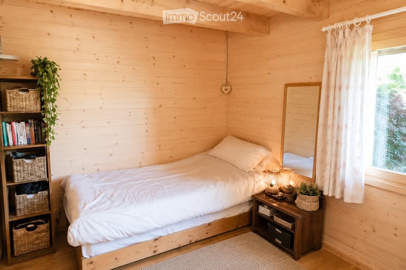 Cozy wooden bedroom with a single bed, nightstand, bookshelf, and potted plants. The room features wooden walls and a large window with white curtains.