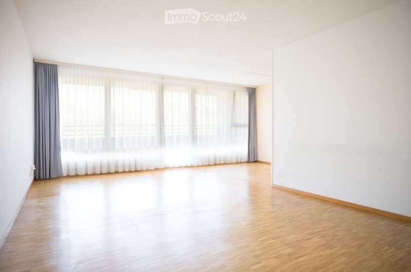 empty room, wooden floor, large windows, white walls